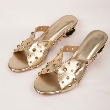 Gold studded heels