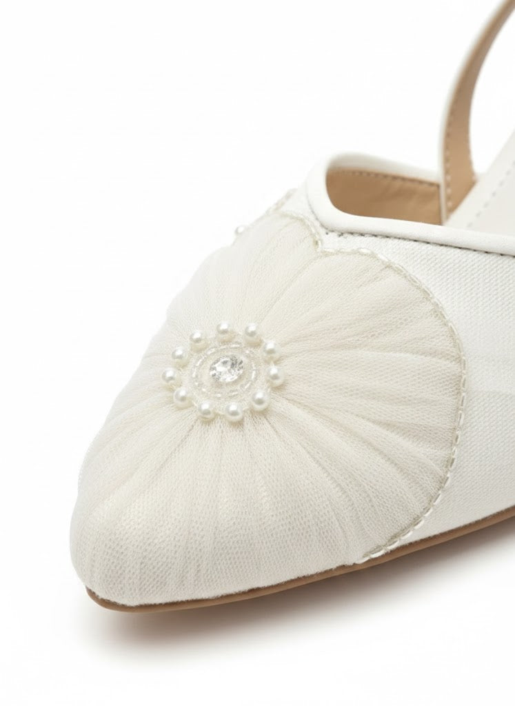 The pearl encrusted mule