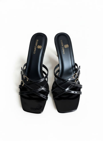Black buckled heel