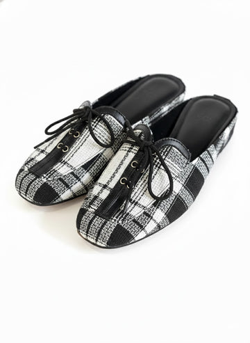 Black and white half shoe